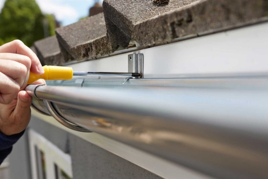 high ladder gutter cleaning, winter gutter cleaning