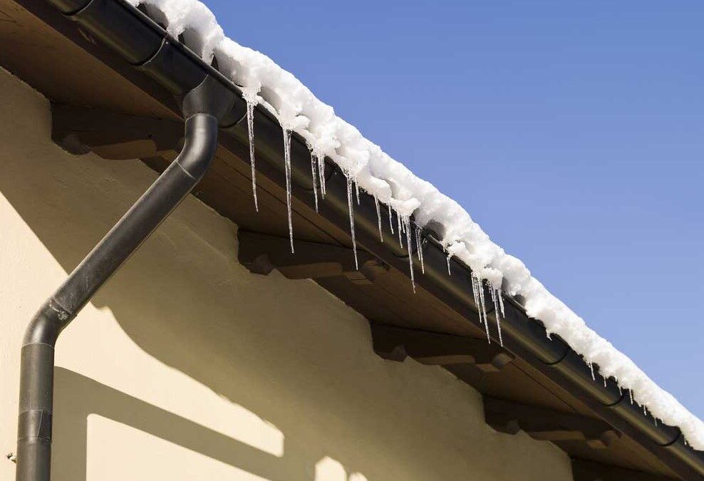 DIY vs. Professional Snow Removal: Pros and Cons for Your Gutters