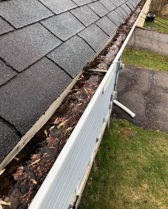 clogged gutters damage